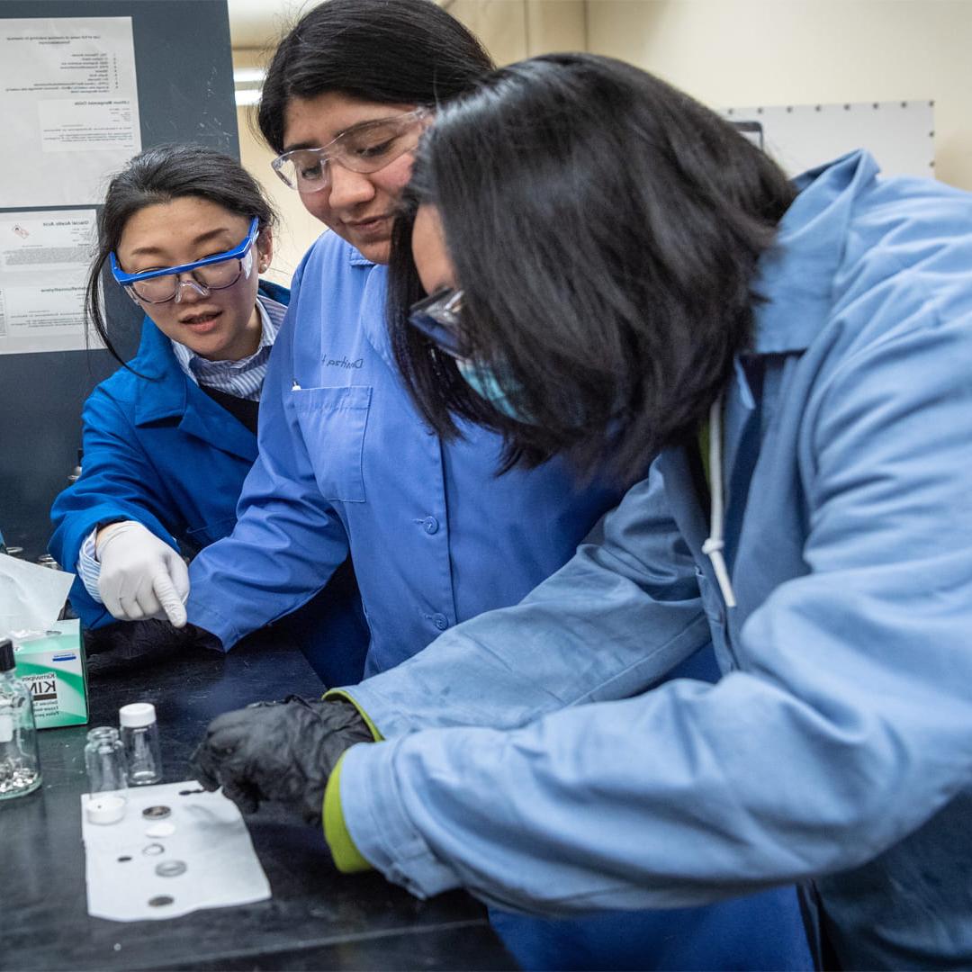 Dahyun Oh, associate professor of materials engineering, in the Energy Materials Lab with students. Photo by Robert C. Bain